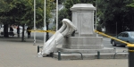 William Rolleston statue the following day with its head broken off. This photograph taken on 22 February 2011 at 5.40pm. The magnitude 6.3 earthquake struck Canterbury at 12:51 pm on Tuesday, 22 February 2011 local time. In total 185 people lost their lives. Photograph: Allan Burgess