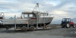 Alloy trailer boats are launched from South Bay to fish for crayfish and other species. Photographs taken 20 August 2013.