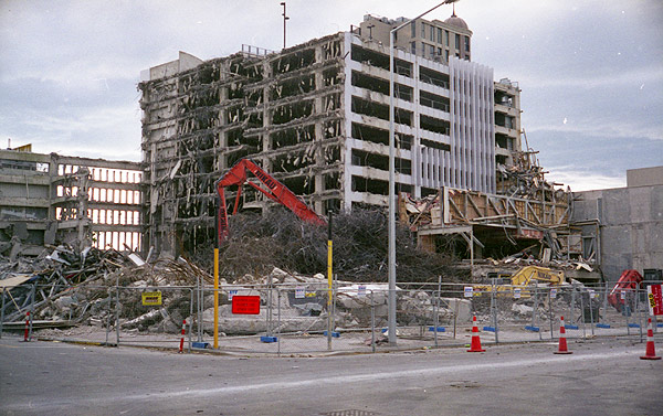 View from the intersection of Colombo and Gloucester Streets, Christchurch, of buildings during demolition following the devastating Canterbury earth quakes of 2010 and 2011. Photograph taken November 2012. Yashica Electro 35