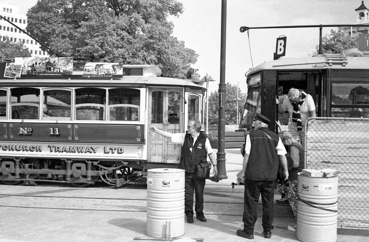 Tram in Cathedral Square Christchurch 2013. Canon Canonet QL19. Converted from colour to black and white in Adobe Photoshop Express.
