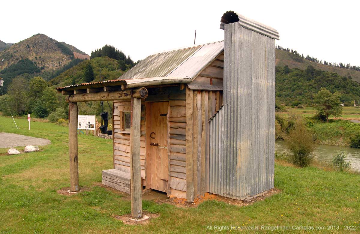 This accurate reproduction of a typical gold miners' hut is located at Canvastown across the road from the Trout Hotel. It has a dirt floor, stone half, and bed that is little more than hessian sacks stretched between two boards. It would have been cosy warm and dry. Although a cramped living space, it would have been a step up from the Calico tents that gold miners lived in, often for years, in the early days from 1864 onwards.