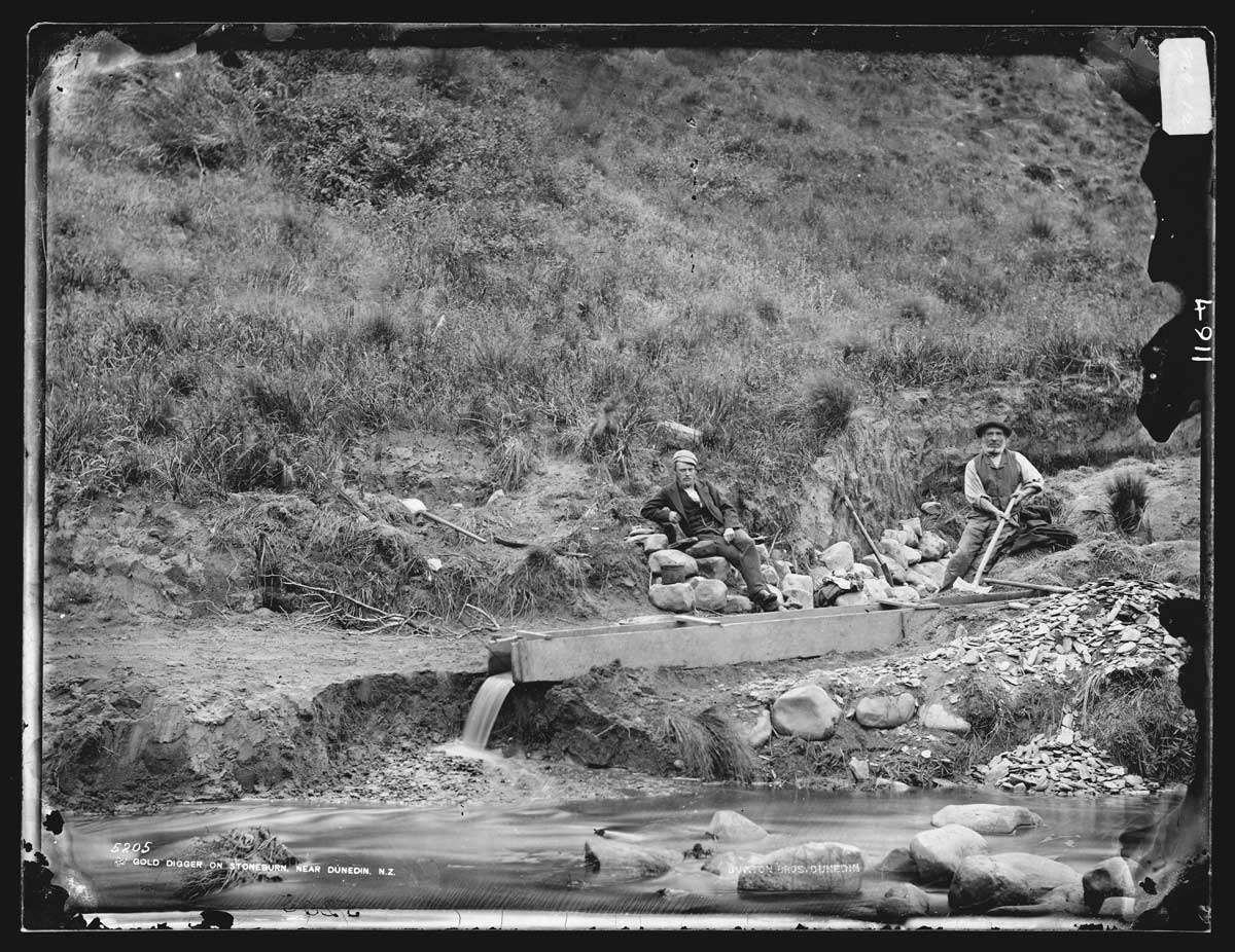 This was the type of sluice used to mine most of the alluvial gold during the 1800s in Wakamarina Valley. Photo credit: Long Tom sluice similar to that used by Gold diggers on Stoneburn, near Dunedin, NZ, 1876-1880, Otago, by William Hart, Hart, Campbell & Co. Purchased 1943. Te Papa (C.014911)
