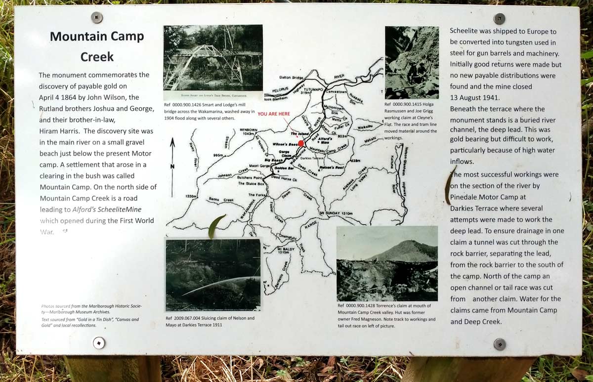 There are many information signs like this one on the Mountain Camp Creek posted beside the road on the eastern side of the river. For the more energetic there are tracks leading down to the Wakamarina River where you can see the remains of old gold prospecting machinery and other points of interest.
